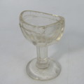 Pair of vintage eye rinse glasses - one hard plastic