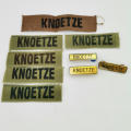 Lot of Various military name tags for KNOETZE