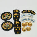 Lot of SA Navy badges and buttons