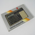 Vintage calculator lighter in box - not working