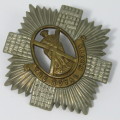 British The Royal Scots cap badge - one lug