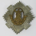 British The Royal Scots cap badge - one lug