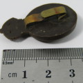 British Army Catering Corps bakelite badge with fold-over clips