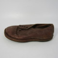 Pair of antique leather boys shoes