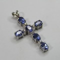 9kt white gold cross with 5 diamonds and 6 oval tanzanites or Iolites
