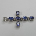 9kt white gold cross with 5 diamonds and 6 oval tanzanites or Iolites