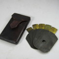 Set of 5 Antique Bruss aperture slides in leather case