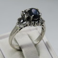 18kt white gold sapphire and diamond ring - weights 3.0g - size J