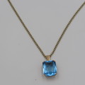 9kt Gold pendant with blue Quartz & gold necklace-clasp not gold - weighs 4.5g - length 48cm