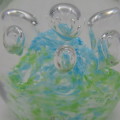 Handmade glass paperweight with bubbles design