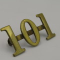 Brass military 101 numeral shoulder title