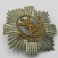 The Royal Scoots cap badge