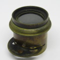 Antique brass camera lens with rotating aperture f11 to f44