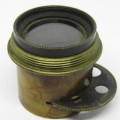 Antique brass camera lens with rotating aperture f11 to f44