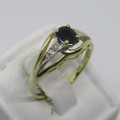 14kt Yellow and White gold Sapphire ring with small diamonds on the side - Size M 1/2