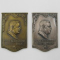 Pair of silver and Bronze Dr HF Vervoerd plaques