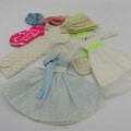 9 Pieces of Barbie and Barbie type doll clothing pieces from the 1960`s
