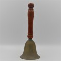 Small brass hand bell with wooden handle