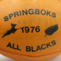 1976 Springboks / All Blacks orange rubber rugby ball