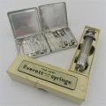 The New Everett glass syringe in box with 2 tins of needles