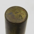 Vintage .303 brass oil bottle with markings on botton