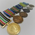 Set of 6 SA Police medals issued to Colonel JW Rooi - Station commander of Vredenburg