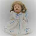 Antique Composition doll with clothing