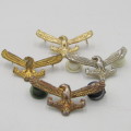 Lot of 4 different colour SA Air Force collar badges