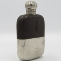 Antique Nickel Plated and glass hipflask with leather cladding