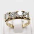 9kt Yellow Gold ring with 4 cubic zirconias - weighs 3,8g - Size O