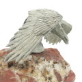 Beautiful white metal eagle sculpture on stone base