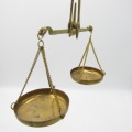 Antique brass pocket balancing scale in case with weights