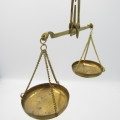 Antique brass pocket balancing scale in case with weights