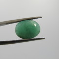 Natural Emerald of 5,22 carat oval mixed cut Medium toned slight bluish green