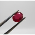 Fracture filled Ruby of 1,9 carat oval mixed cut slight violet red with Gemlab certificate