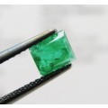 Natural Emerald of 0,68 carat Baguette shape medium dark toned slight bluish green