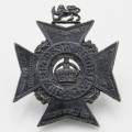 The Rhodesia Regiment cap badge - one lug