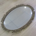 Vintage Oval bevelled mirror with ornate frame