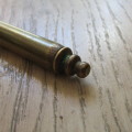 Very long antique brass candle snuffer