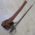 Royal Artillery sword in leather sleeve who belonged to TEJ St Vaughan