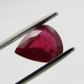Dark toned slightly purplish red Ruby - fracture filled - 4,92 carat Pear shape