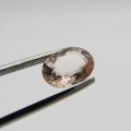 Natural Morganite of 2,5 carat oval mixed cut - slightly Orange Pink with Gemlab certificate