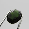 Tourmaline of 9,3 carat - oval mixed cut - dark toned green with Gemlab certificate