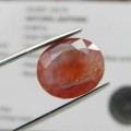 Natural Orange / Blue Sapphire of 9,67 carat oval mixed cut certified by Gemlab with certificate