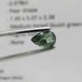 Natural Sapphire of 0,97 carat - Pear shape - medium toned bluish green with Gemlab certificate