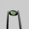 Natural Sapphire of 0,67 carat - Medium toned green - oval mixed cut - with Gemlab certificate