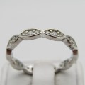 Sterling Silver infinity style ring - Size Q - 2g