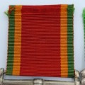 Pair of WW2 medals issued to C169528 T Paulsen - Africa service medal and WW2 Defence medal