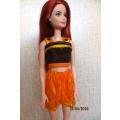 Barbie doll's shorts and brown top
