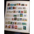 Stamp album with approx 800 stamps.